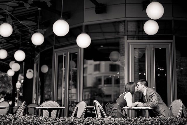 Couple Kissing at Bistro Niko restaurant